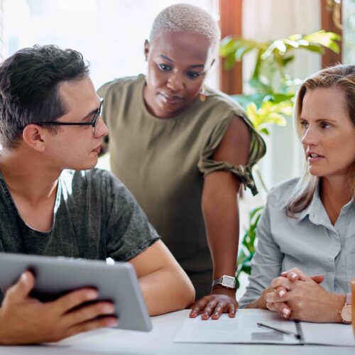 Three People Learning About Mortgages